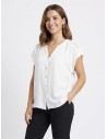 Top manche courte élégant avec détails ajourés au dos, fabrication en Italie - Zerda Boutique