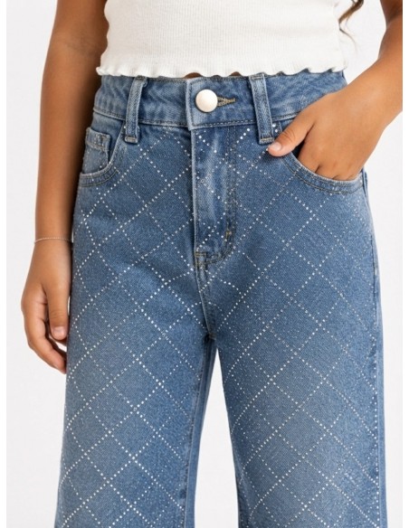 Détail taille haute du jean fille strass large